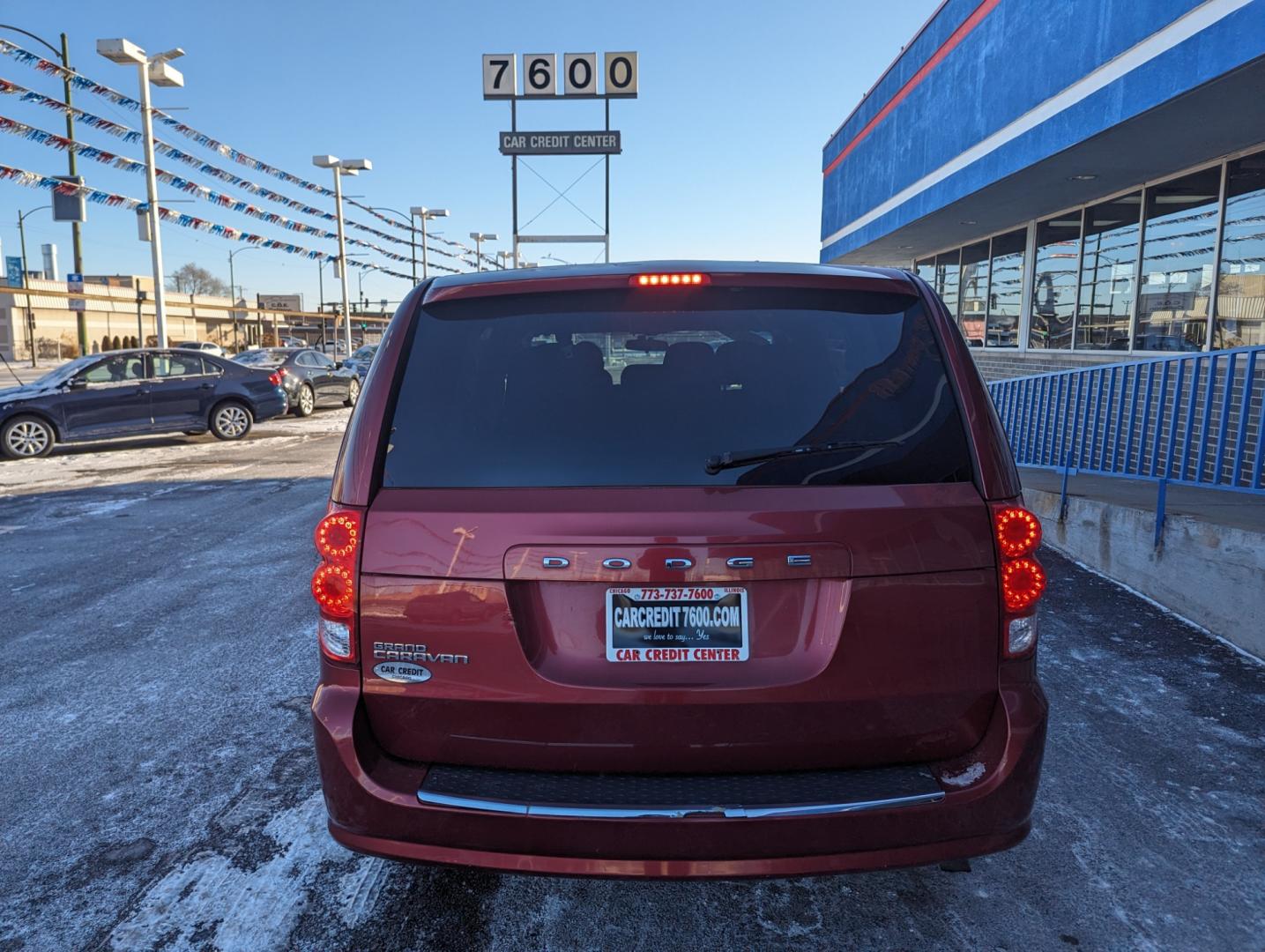 2014 RED Dodge Grand Caravan SE (2C4RDGBG8ER) with an 3.6L V6 DOHC 24V engine, 6-Speed Automatic transmission, located at 7600 S Western Ave., Chicago, IL, 60620, (773) 918-3980, 0.000000, 0.000000 - Photo#3